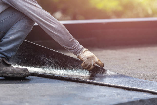 Professional Waterproofing technician working in Albany, OH